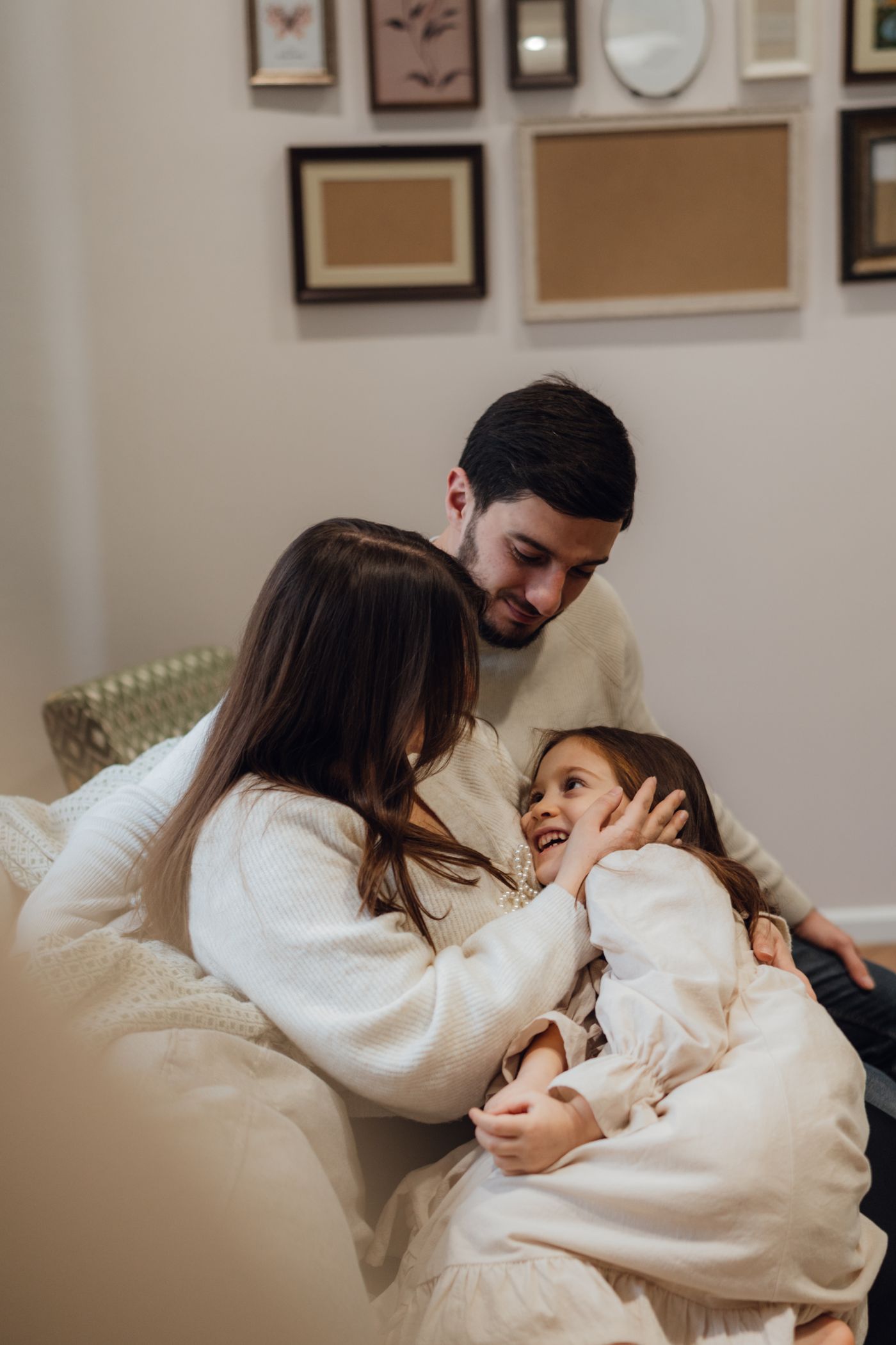 A family relaxing together at home, peace of mind that income protection provides