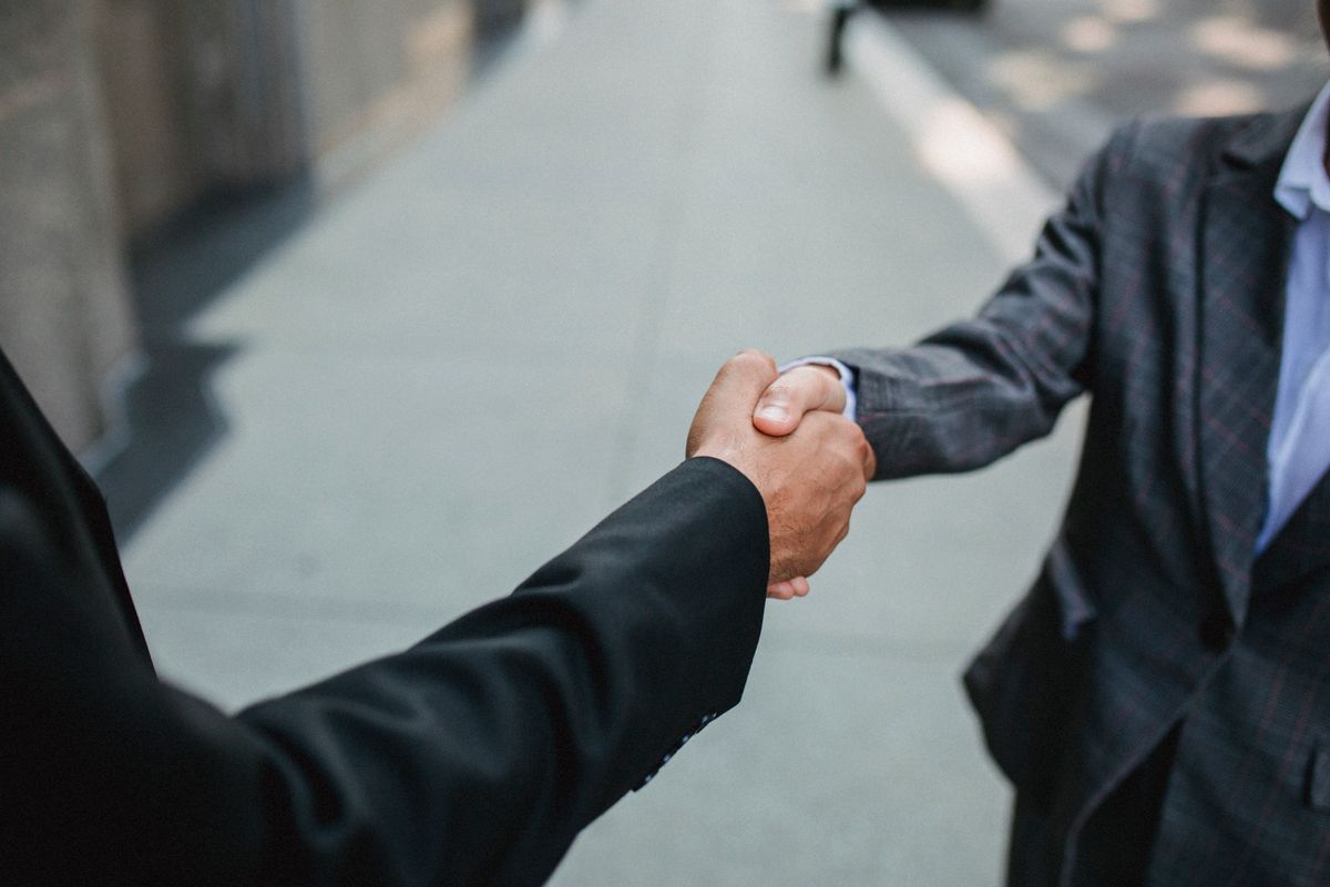 Warm handshake sealing an agreement